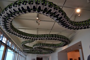 Ai Weiwei's Snake Ceiling, a serpentine form made from children's backpacks, commemorates the thousands of students who died in poorly constructed schools during the 2008 Sichuan earthquake.